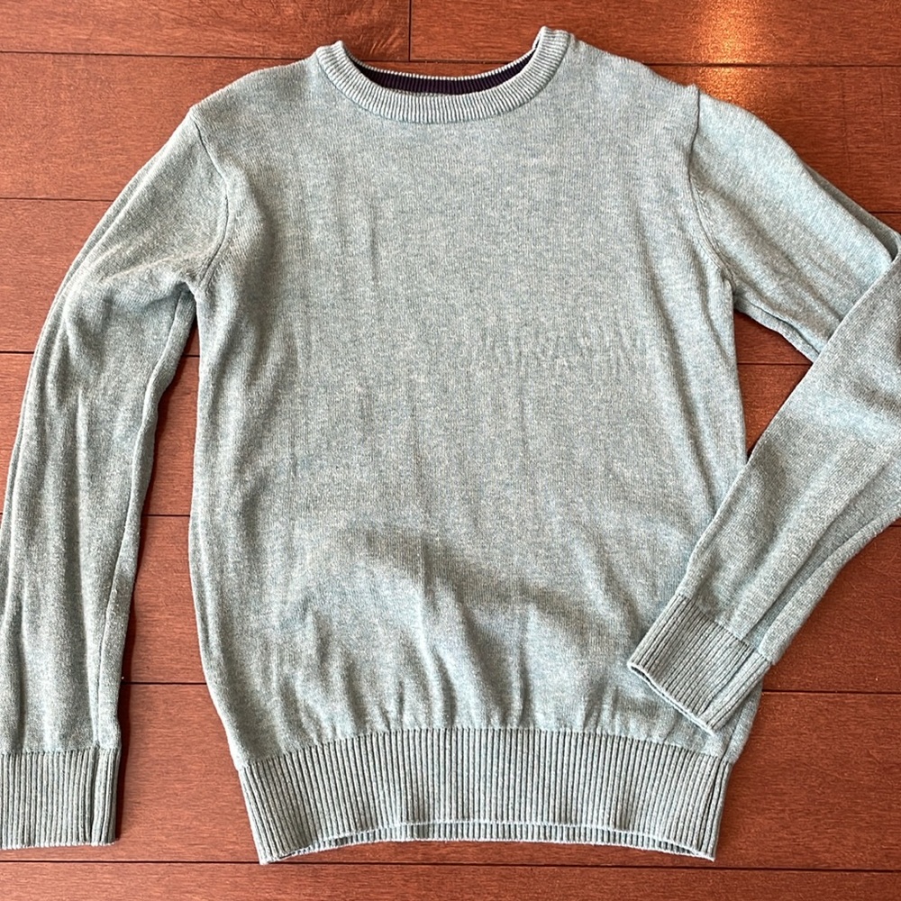 Pale green knit sweater